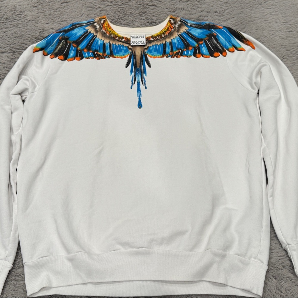 White Sweater with Vibrant Wing Design